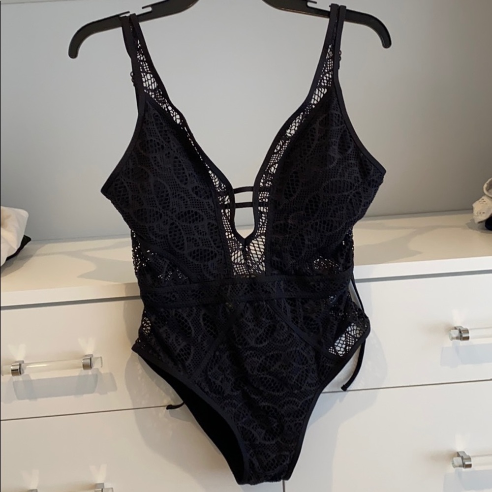Never worn one piece
